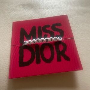 Dior Bracelet with White Beads on Red Card
